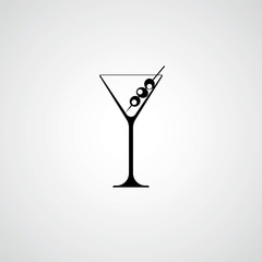 A glass for a martini. Cocktail with olives. Black silhouette. V