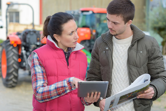 Agronomist Helping Farmer Planning The Harvest