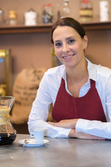 smiling barista at the bar