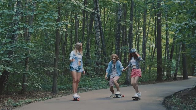 Young friends skateboarding