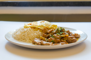 Thai food, Garlic Pork with steam rice and fried egg 