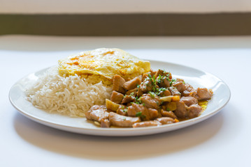 Thai food, Garlic Pork with steam rice and fried egg 