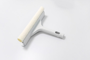 White glass window cleaner with plastic handheld isolated on white background. Window wiper with sponge and blade