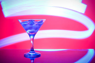 glass with cocktail in a nightclub