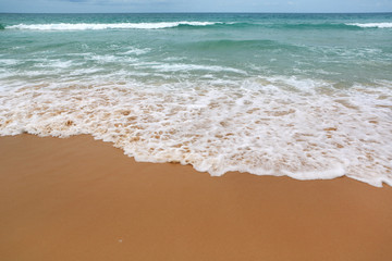 Fototapeta na wymiar Landscape view of sea wave on the beach sand.
