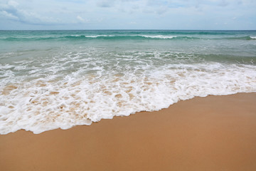 Fototapeta na wymiar Wave is covering on beach.