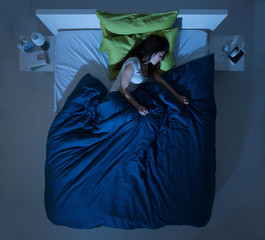 Woman sleeping in the bedroom