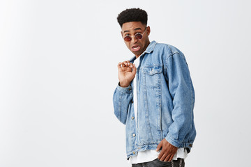 Seeing ex girlfriend with ugly guy. Portrait of young attractive black-skinned man with afro...