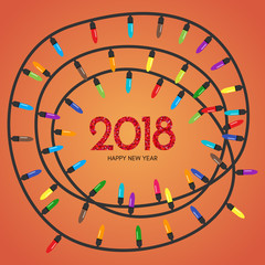 Multi сolored Christmas garland and inscription 2018 inside
