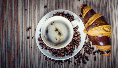 Chocolate croissant with coffee
