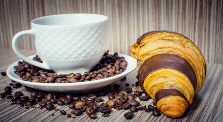 Chocolate croissant with coffee