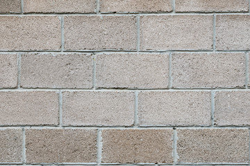 Fototapeta premium Fence construction material French brick four rows, classic masonry closeup, concept Foundation, background