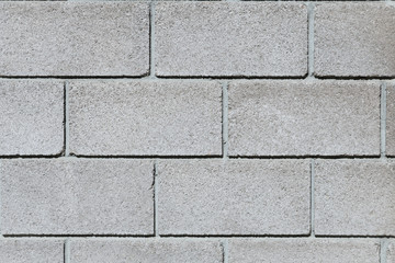 Fence construction material white French brick four rows, classic masonry closeup, concept Foundation, background