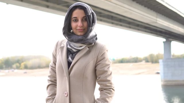 Portrait of a brunette muslim girl, outdoors