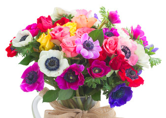 Fresh colorful Anemones and roses flowers bouqet isolated on white background