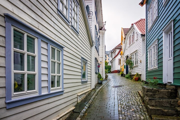 Fototapeta na wymiar Narrow cobble stoned streets in the old part of Bergen town