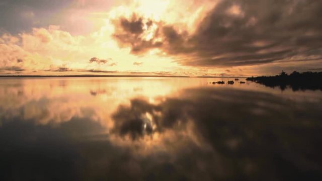Timelapse of a sunrise over the Amazon River