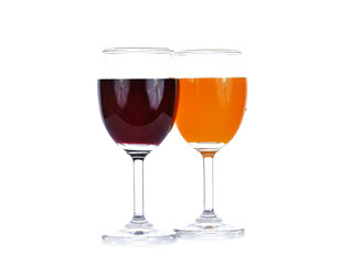 Grape juice, orange juice in glass on white background