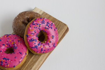 One Plain and Two Pink and Donuts