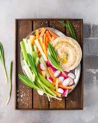 Traditional classic hummus of chickpeas, olive oil and spices. Served with fresh vegetables:...