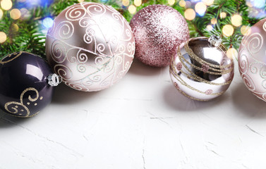 Christmas decoration. Christmas baubles in pink color on white background