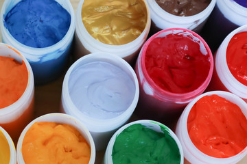 Obraz premium Varieties of colors in white bottles.