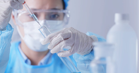 Serious scientist is doing her research