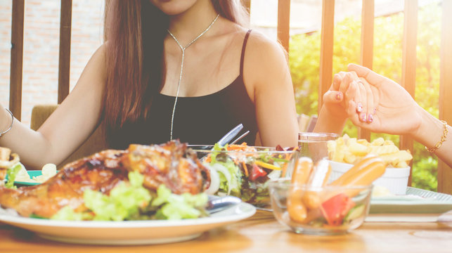 Close-up,Asain Hand  Thanking To God Before Eating Food On Table On (Thanksgiving Day)