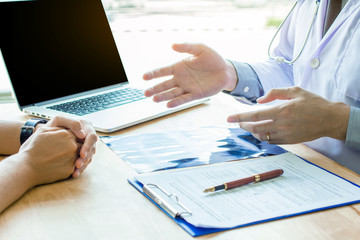 Doctor Holding Pens and Mentoring Patients, Treating Cancer and Introducing, Taking Care of Yourself