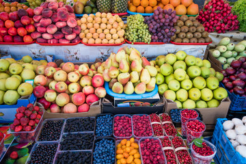 Fruit market with various colorful fresh fruits. Fresh fruits.  Fruits  at a farmers market