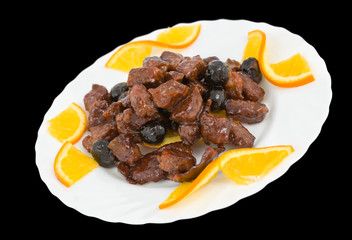 Chinese food. Caramelized meat with prunes.