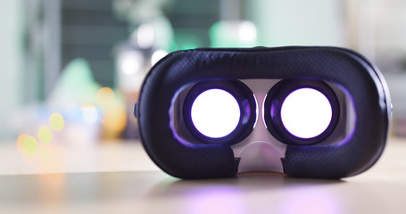 Virtual Reality device playing movie at night