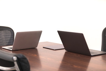 laptop PCs on the table.