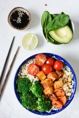 Buddha bowl healthy vegetarian salad with broccoli, wild rice, tofu, carrots and tofu. Balanced meal, healthy lifestyle and healthy eating concept