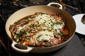 Baked eggplants with cheese sauce