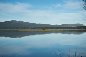 View of Bruny Island beach in Tasmania, Australia in the late afternoon.