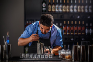 Bartender preparing an alcoholic beverage