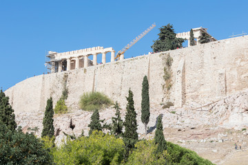 Acropolis, Athens, Greece - October 24, 2017: Many tourists from different nations visit the Parthenon temple on the Acropolis hill.