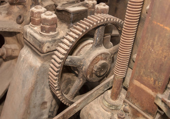 Old rusted gears on a machine