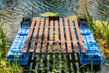 Naklejka premium small raft on the river