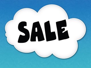 White cloud with SALE message on blue sky background.