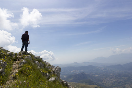 hiker on mountain trail