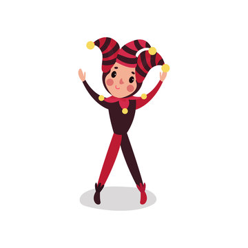 Happy joker cartoon character performing with hands up. Boy in black and red festival fool costume.