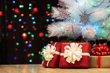 Close-up of a decorated Christmas tree. Christmas decorations, garland illumination bokeh