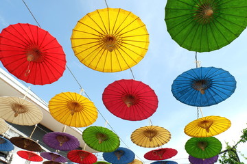 Fototapeta na wymiar Colorful umbrella decorate on top of market 