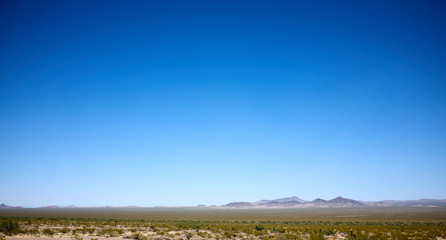 Desert view with lots of blue sky