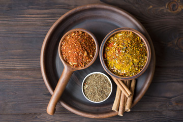 Variety of spices on kitchen table.