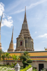 Fototapeta premium Pagoda is in Wat Pho that was named as the temple of the pagoda or chedi that are decorated with yellow glaze or glazed tiles or dark blue