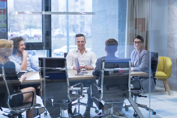 Startup Business Team At A Meeting at modern office building