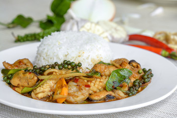 Seafoods cooked with thai spicy paste and thai harb